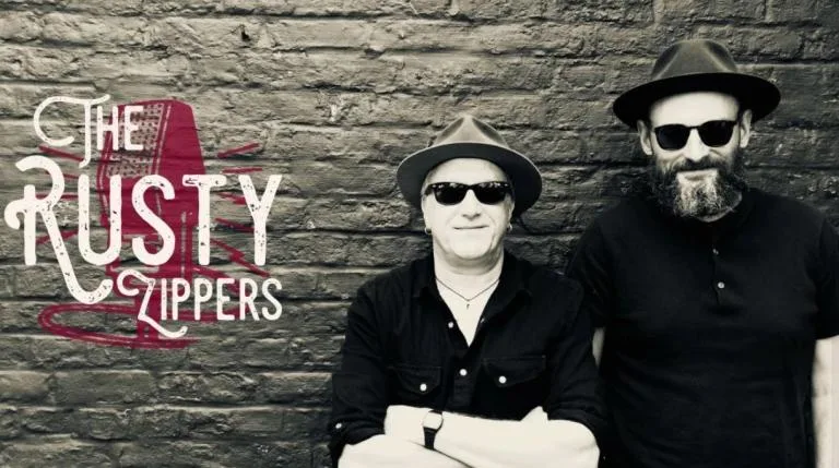 The RUSTY ZIPPERS